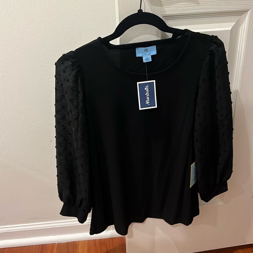 Cute Black Blouse with polka dot sleeves